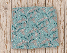 Hand block printed mulmul cotton fabric in aqua blue with Indian trailing leaf pattern