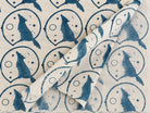 Indigo wolf and moon motifs on soft cream hand block printed cotton fabric