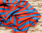 Red and blue striped lightweight cotton fabric, hand screen printed in India
