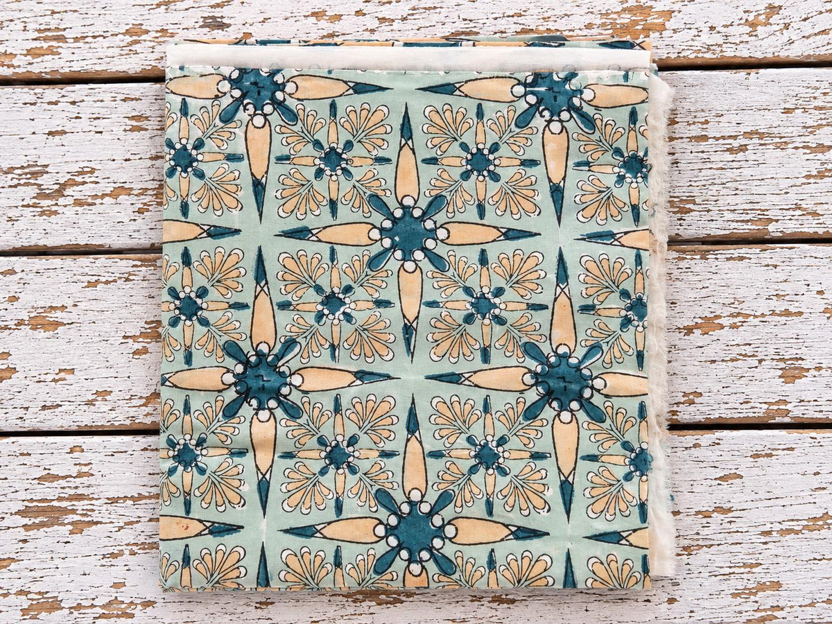 Vintage Starflower hand block printed mulmul cotton fabric in mint green, teal and peach