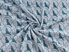Muted dusty blue wolf and moon pattern on light blue hand block printed cotton fabric