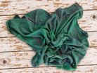 one metre square vintage green sari silk fabric with floral paisley pattern
