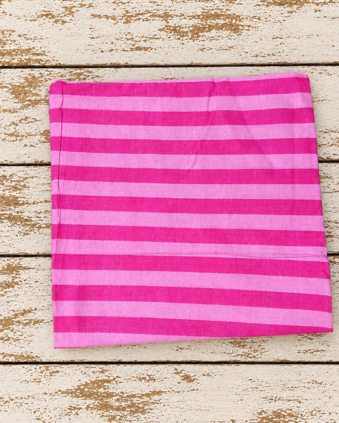 Hot pink and light pink striped cotton textile, hand screen printed in India