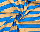 Close view of blue and beige 1.5 inch stripes on lightweight hand screen printed cotton fabric