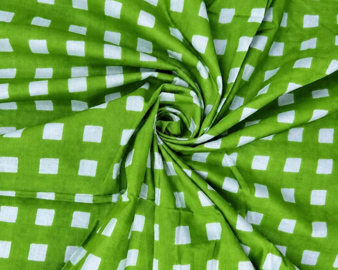 Close-up of vivid green fabric featuring a repeating white gingham check pattern.