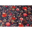 Hand-printed cotton velvet with red-orange flowers on dark blue base – flatlay
