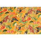 Close-up of monkey and tropical leaves on mustard velvet