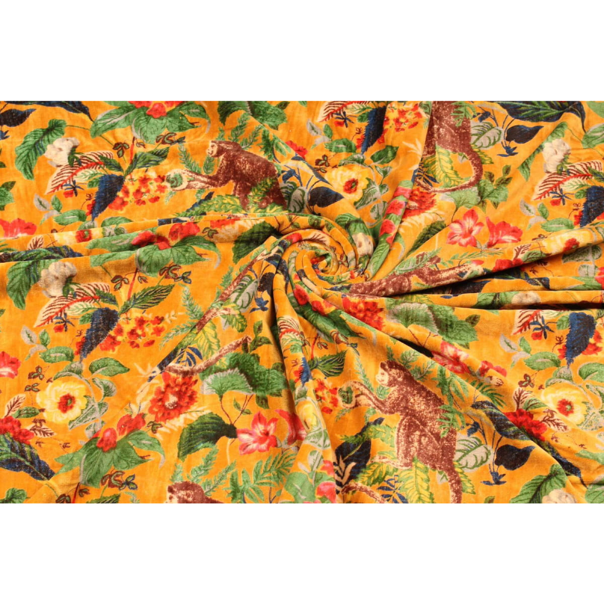 Folded mustard velvet showing lush foliage and animal print