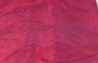 Close-up of Magenta Orchid dupion silk fabric showing raw silk texture, natural slubs, and magenta orchid iridescent sheen