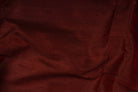 Close-up of Mahogany Burgundy Dupion Silk Fabric showing natural slub texture, woven silk detail, and subtle colour variation