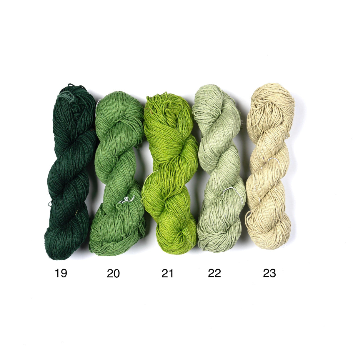 Mercerized Cotton Yarn – five shades of green, soft mercerized cotton skeins.