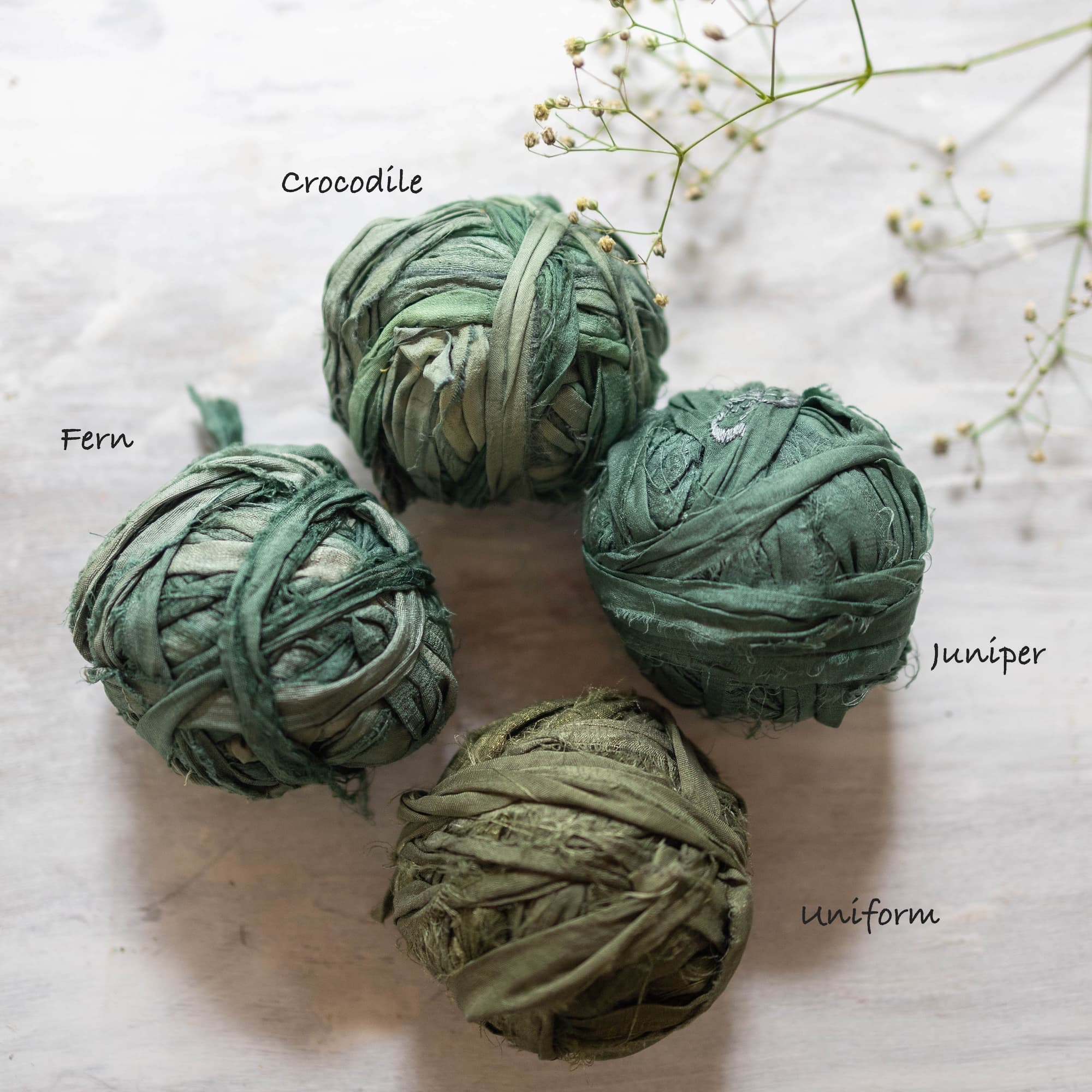 green saree silk ribbon with rich jewel tone, perfect for floral design, crafts, and styling.
