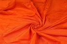 Orange Dupion Silk Fabric with natural slub texture and silk sheen