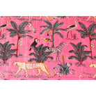 Close-up of hand-printed cheetah and bird motifs on pink velvet