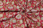 Raspberry Lotus Vine floral block print cotton fabric gathered to display drape and movement