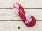 Single skein of Berry Blossom recycled sari silk ribbon yarn