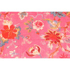 Medium pink cotton velvet with red and beige floral print – flatlay view