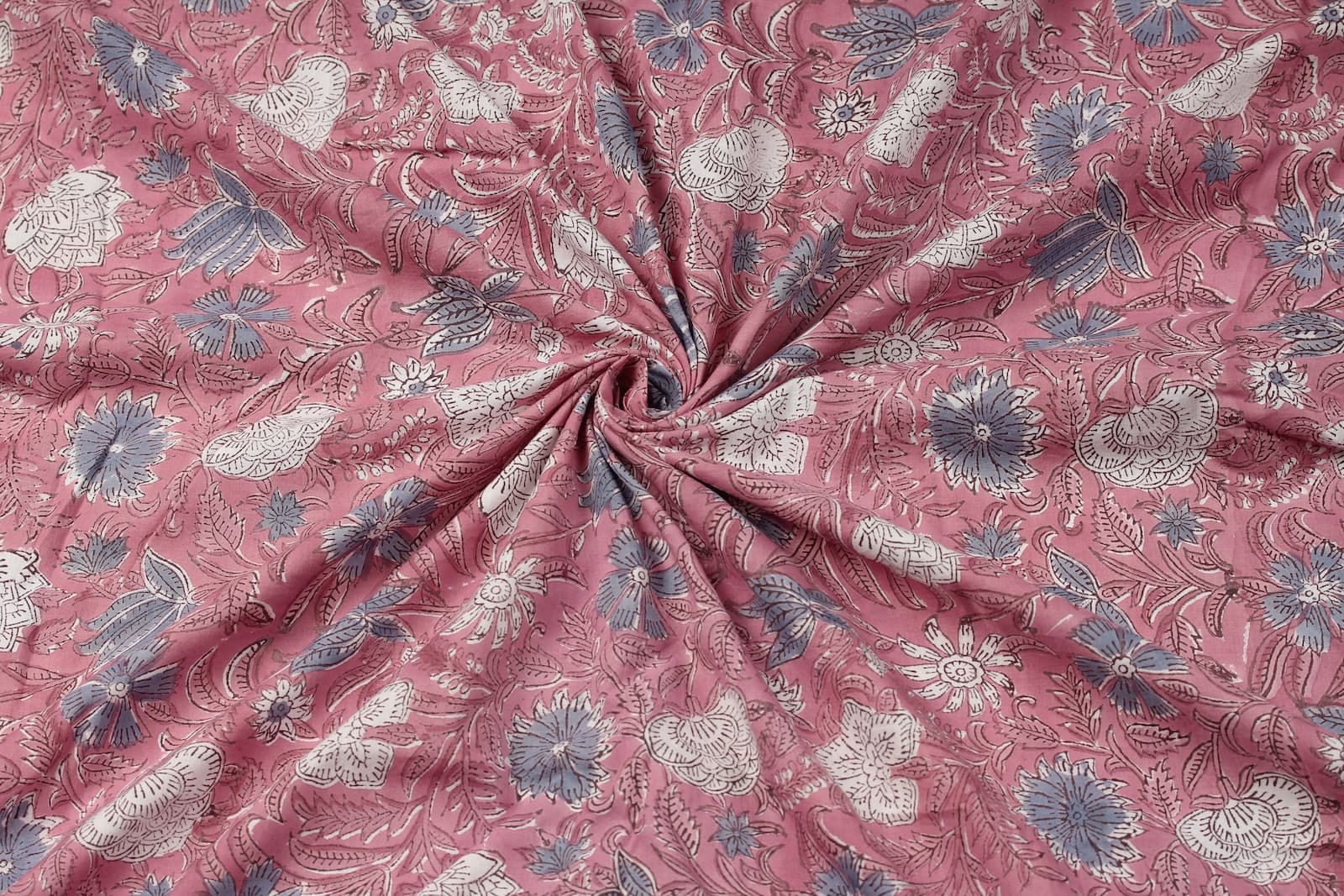 Rosewood Meadow hand block printed cotton fabric showing soft drape and floral meadow pattern