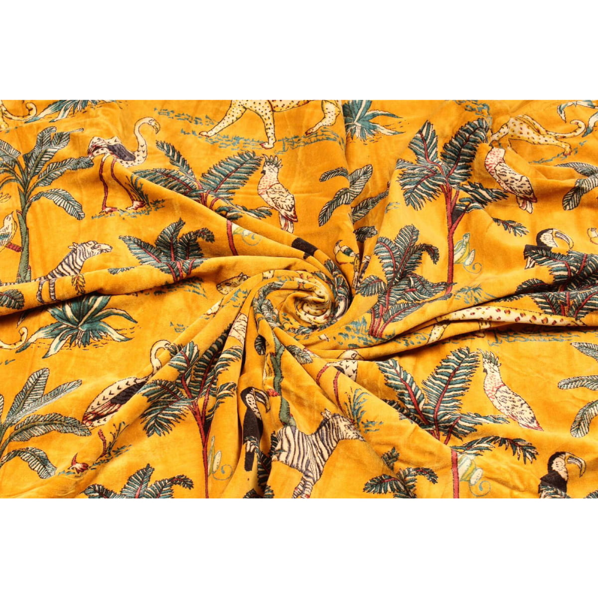 Folded mustard velvet showing forest scene and animal print texture