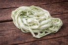 Sage Mist sari silk ribbon showing natural texture and frayed edges