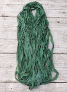 Eucalyptus sari silk ribbon bundle showing natural texture