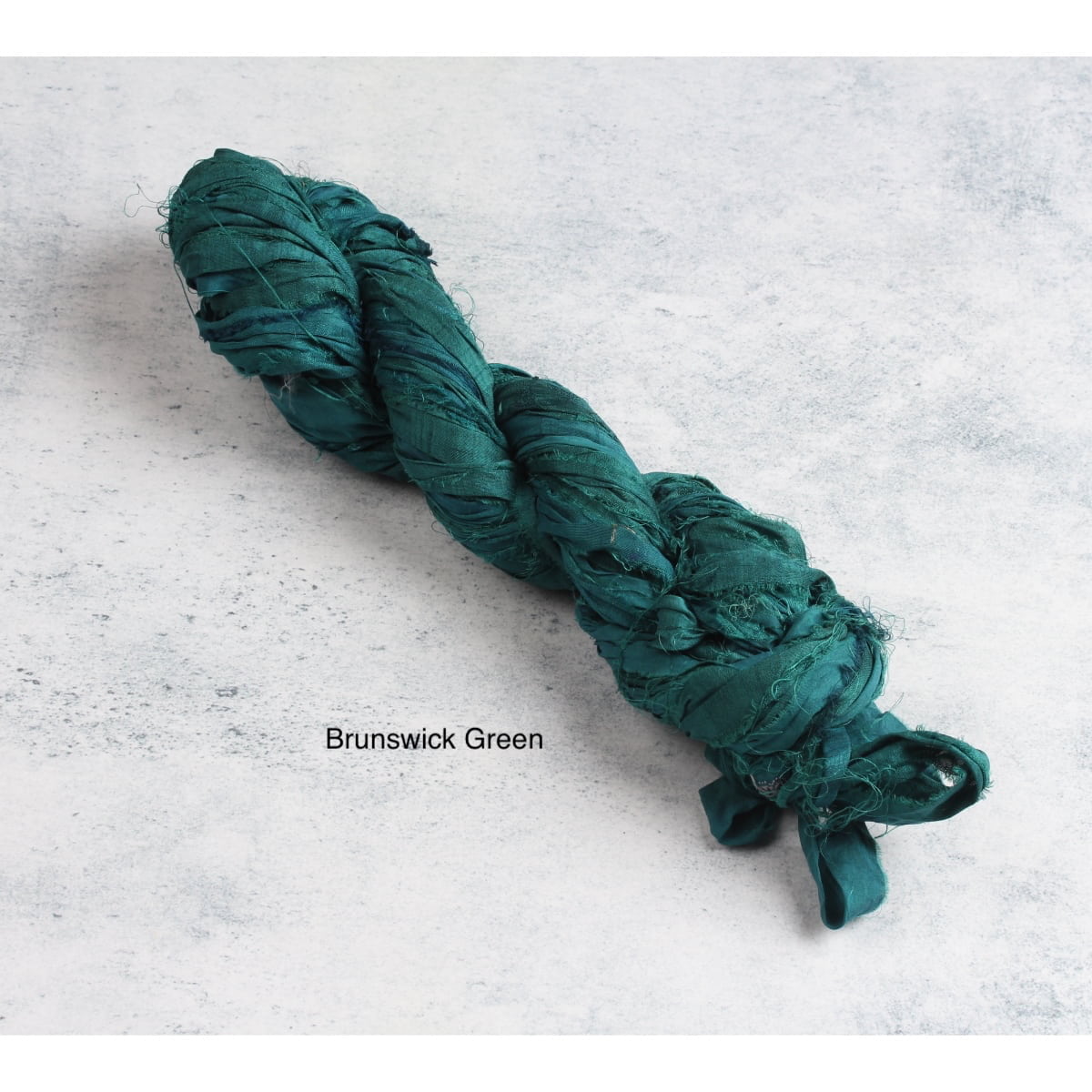 Brunswick green sari silk ribbon skein – deep rich recycled silk yarn for textile art