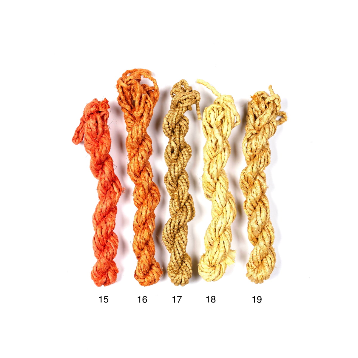 Sari silk cords in canary, mustard, tangerine, and fire orange shades for crafts