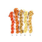 Sari silk cords in canary, mustard, tangerine, and fire orange shades for crafts