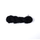 Deep, rich black sari silk yarn hand-spun from recycled silk. Luxurious texture and natural sheen, perfect for elegant weaving or crochet projects.