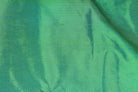Close-up of Seafoam Green Dupion Silk Fabric showing natural slub texture, woven silk detail, and subtle colour variation