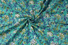 Seafoam Wildflower Trail floral block print cotton fabric gathered to showcase drape, texture, and pattern detail