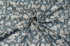 Slate Meadow Bloom floral block print cotton fabric gathered to display drape, texture, and botanical pattern detail