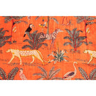 Close-up of exotic animal and foliage print on orange hand-printed velvet