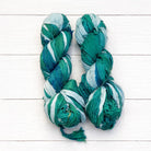 Ocean Mist recycled sari silk ribbon yarn skeins in teal aqua and seafoam white