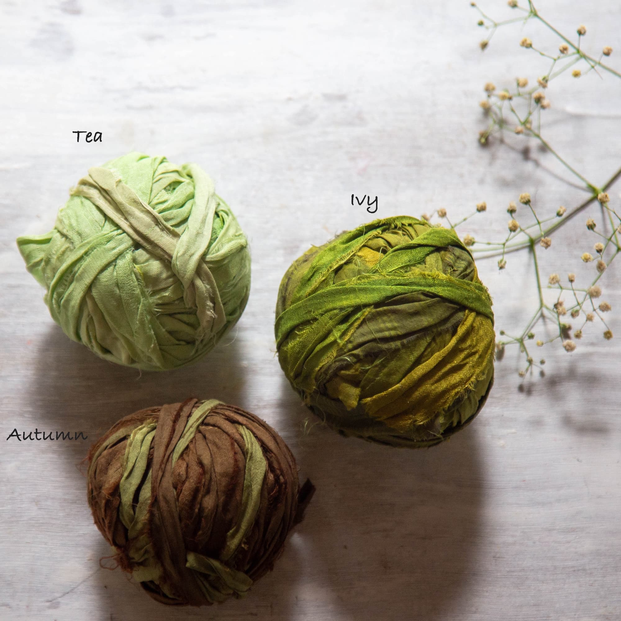 Un usual green saree silk ribbon with deep natural tones, ideal for weddings, crafts, and decorations.